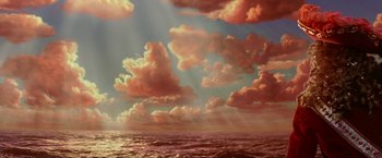 Movie still from “Peter Pan” (2003), directed by P.J. Hogan – A painting of a sky filled with red clouds; Extreme Wide shot, Low angle