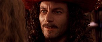 Movie still from “Peter Pan” (2003), directed by P.J. Hogan – A person wearing a hat; Close Up shot, Low angle