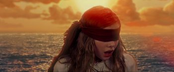 Movie still from “Peter Pan” (2003), directed by P.J. Hogan – A woman with a blindfold on her head; Close Up shot, High angle