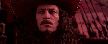 Movie still from “Peter Pan” (2003), directed by P.J. Hogan – A person wearing a hat; Close Up shot, Low angle