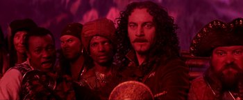 Movie still from “Peter Pan” (2003), directed by P.J. Hogan – A group of men standing next to each other; Medium shot, Low angle