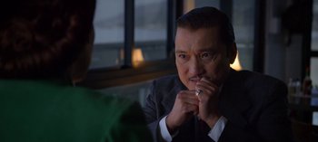 Movie still from “Ratched” (2020), created by Evan Romansky – A man sitting in front of another man in a suit; Close Up shot, Over the shoulder angle