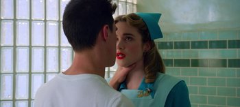 Movie still from “Ratched” (2020), created by Evan Romansky – A man and a woman are looking into each others eyes; Close Up shot, Over the shoulder angle