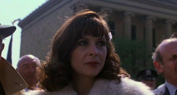 Movie still from “Rocky III” (1982), directed by Sylvester Stallone – A person wearing a fur coat; Close Up shot, Low angle