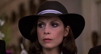 Movie still from “Rocky III” (1982), directed by Sylvester Stallone – A person wearing a hat; Close Up shot, Low angle