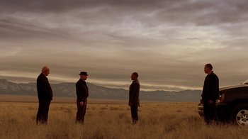 Movie still from “Breaking Bad” (2008), created by Vince Gilligan – Two men standing in the middle of an open field; Extreme Wide shot, Low angle