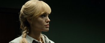 Movie still from “Salt” (2010), directed by Phillip Noyce – A person wearing a jacket; Close Up shot, Low angle