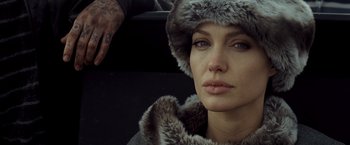 Movie still from “Salt” (2010), directed by Phillip Noyce – A person wearing a fur hat; Close Up shot, Over the shoulder angle