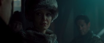Movie still from “Salt” (2010), directed by Phillip Noyce – A person wearing a fur hat; Close Up shot, Low angle