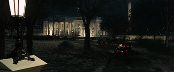 Movie still from “Salt” (2010), directed by Phillip Noyce – The white house is lit up at night time; Extreme Wide shot, Low angle
