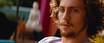 Movie still from “Savages” (2012), directed by Oliver Stone – A person with a beard; Close Up shot, Over the shoulder angle