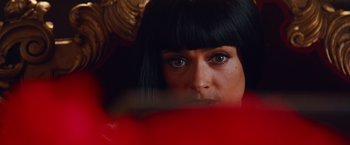 Movie still from “Savages” (2012), directed by Oliver Stone – A person with long black hair; Close Up shot, Overhead angle