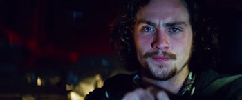 Movie still from “Savages” (2012), directed by Oliver Stone – A person with long hair; Close Up shot, Low angle