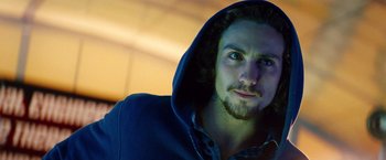 Movie still from “Savages” (2012), directed by Oliver Stone – A person wearing a hooded sweatshirt; Close Up shot, Low angle