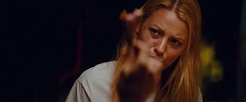 Movie still from “Savages” (2012), directed by Oliver Stone – A woman with a knife in her hand; Close Up shot, Low angle