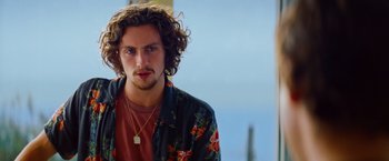 Movie still from “Savages” (2012), directed by Oliver Stone – A person wearing a jacket; Close Up shot, Low angle