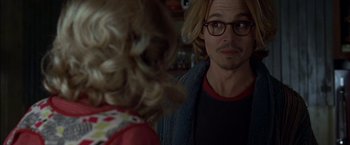 Movie still from “Secret Window” (2004), directed by David Koepp – A man and a little girl are looking at each other; Close Up shot, Over the shoulder angle