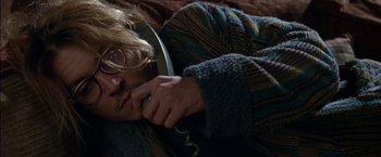 Movie still from “Secret Window” (2004), directed by David Koepp – A man is lying on the bed talking on the phone; Close Up shot, Overhead angle
