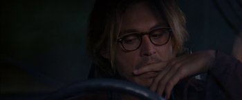 Movie still from “Secret Window” (2004), directed by David Koepp – A person wearing glasses; Close Up shot, Over the shoulder angle