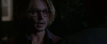 Movie still from “Secret Window” (2004), directed by David Koepp – A person wearing glasses; Close Up shot, Over the shoulder angle