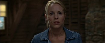 Movie still from “Secret Window” (2004), directed by David Koepp – A woman in a denim jacket looking at the camera; Close Up shot, Low angle