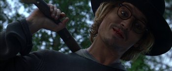 Movie still from “Secret Window” (2004), directed by David Koepp – A person holding a baseball bat; Close Up shot, Low angle
