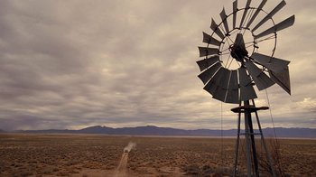 Movie still from “Breaking Bad” (2008), created by Vince Gilligan – A windmill in the middle of an empty field; Extreme Wide shot, Low angle