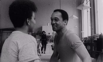 Movie still from “She's Gotta Have It” (1986), directed by Spike Lee – A man and a woman talking to each other; Medium shot, Over the shoulder angle