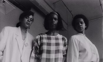 Movie still from “She's Gotta Have It” (1986), directed by Spike Lee – A group of women standing next to each other; Medium shot, Low angle