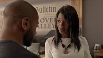 Movie still from “Slasher” (2016), created by Aaron Martin – A man and a woman talking to each other; Close Up shot, Over the shoulder angle