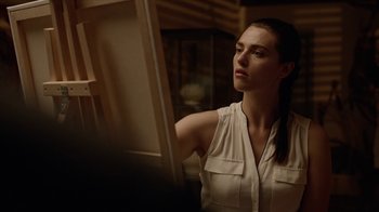 Movie still from “Slasher” (2016), created by Aaron Martin – A beautiful young lady standing in front of a mirror; Close Up shot, Over the shoulder angle