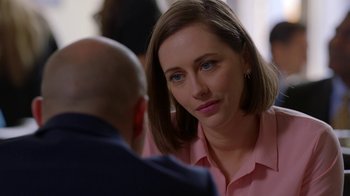 Movie still from “Slasher” (2016), created by Aaron Martin – A woman in a pink shirt talking to a man in a blue shirt; Close Up shot, Over the shoulder angle