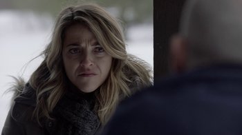 Movie still from “Slasher” (2016), created by Aaron Martin – A person looking at the camera; Close Up shot, Over the shoulder angle