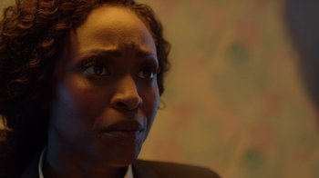 Movie still from “Slasher” (2016), created by Aaron Martin – A person looking at the camera; Close Up shot, Over the shoulder angle