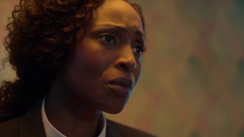 Movie still from “Slasher” (2016), created by Aaron Martin – A person looking up at the sky; Close Up shot, Over the shoulder angle