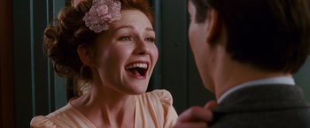 Movie still from “Spider-Man 3” (2007), directed by Sam Raimi – A person laughing with a person; Close Up shot, Over the shoulder angle