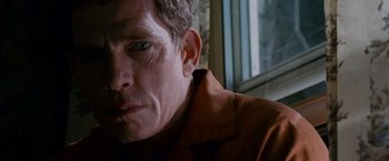 Movie still from “Spider-Man 3” (2007), directed by Sam Raimi – A person wearing a brown shirt; Close Up shot, Over the shoulder angle