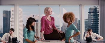 Movie still from “Spider-Man 3” (2007), directed by Sam Raimi – A group of women standing next to each other in front of a window; Medium shot, Low angle