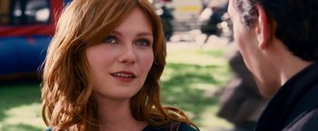 Movie still from “Spider-Man 3” (2007), directed by Sam Raimi – A person with long red hair; Close Up shot, Over the shoulder angle