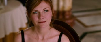 Movie still from “Spider-Man 3” (2007), directed by Sam Raimi – A person wearing a necklace; Close Up shot, Over the shoulder angle