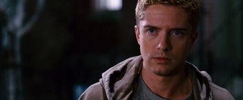 Movie still from “Spider-Man 3” (2007), directed by Sam Raimi – A person wearing a jacket; Close Up shot, Over the shoulder angle