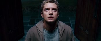 Movie still from “Spider-Man 3” (2007), directed by Sam Raimi – A person looking up at the sky; Close Up shot, Overhead angle