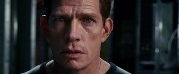 Movie still from “Spider-Man 3” (2007), directed by Sam Raimi – A man's face with blue eyes; Close Up shot, Over the shoulder angle