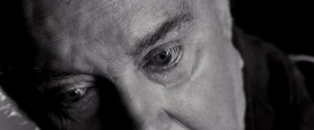 Movie still from “Spider-Man 3” (2007), directed by Sam Raimi – A man's eye and his face; Extreme Close Up shot, Overhead angle
