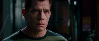 Movie still from “Spider-Man 3” (2007), directed by Sam Raimi – A person wearing a striped shirt; Close Up shot, Over the shoulder angle