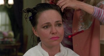 Movie still from “Steel Magnolias” (1989), directed by Herbert Ross – A person getting their hair dried; Close Up shot, High angle
