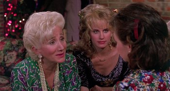 Movie still from “Steel Magnolias” (1989), directed by Herbert Ross – A group of women sitting next to each other at a table; Close Up shot, Over the shoulder angle