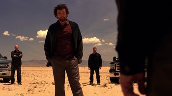 Movie still from “Breaking Bad” (2008), created by Vince Gilligan – Two men standing in the middle of the desert; Wide shot, Low angle