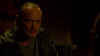 Movie still from “Breaking Bad” (2008), created by Vince Gilligan – A person wearing a jacket; Close Up shot, Over the shoulder angle