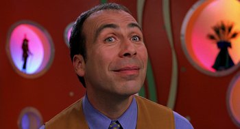 Movie still from “Stuart Little” (1999), directed by Rob Minkoff – A person wearing a tie; Close Up shot, Low angle